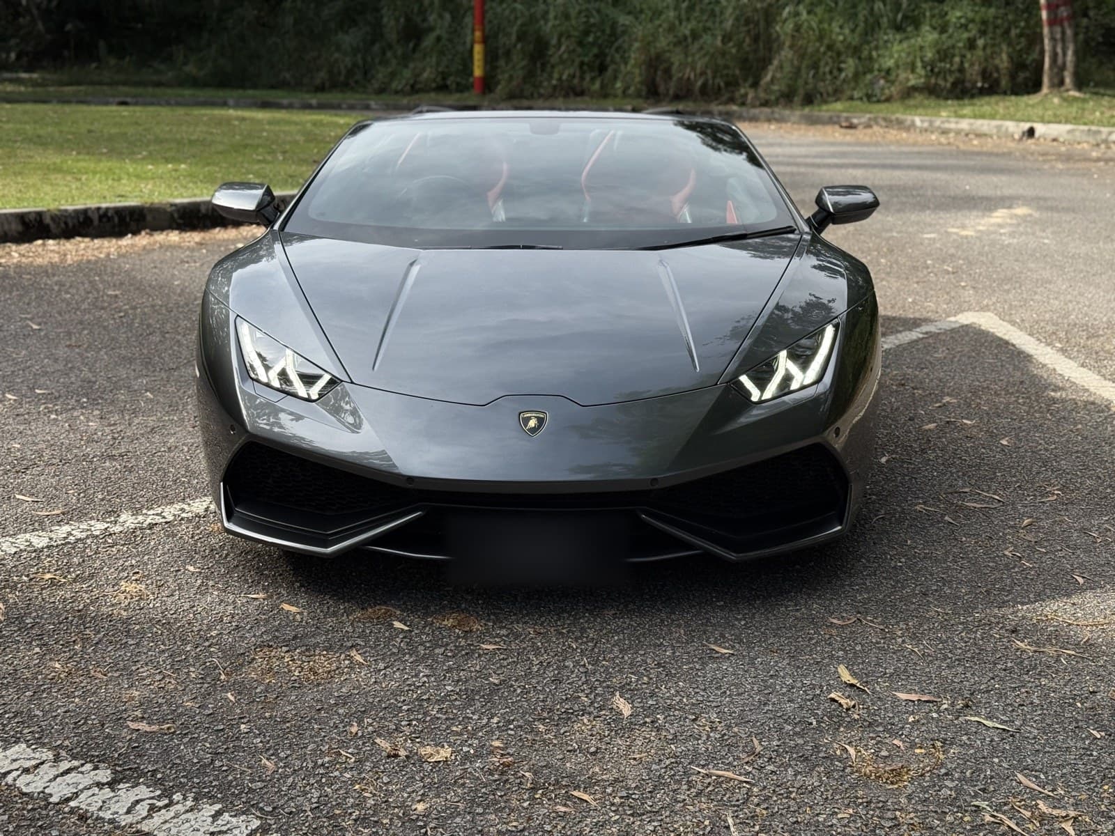 Rent a 2022 Lamborghini Huracán EVO Spyder in Kuala Lumpur — Open-top V10 drama for golden hour.